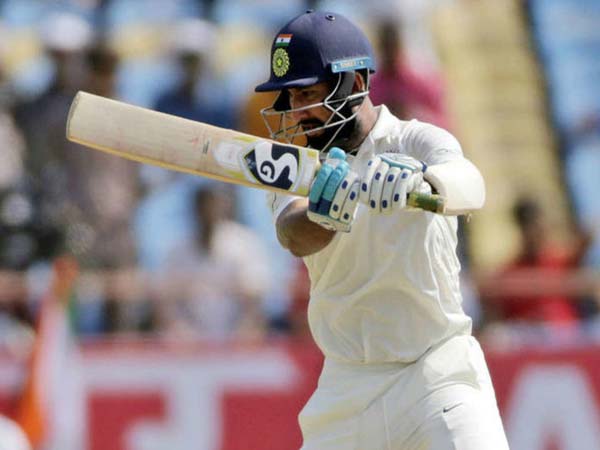 పుజారా హాఫ్ సెంచరీ
