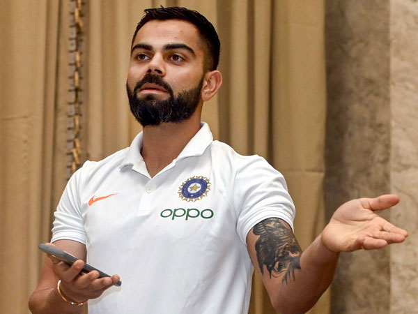 కోహ్లీ ఓటు ఎవరికి: